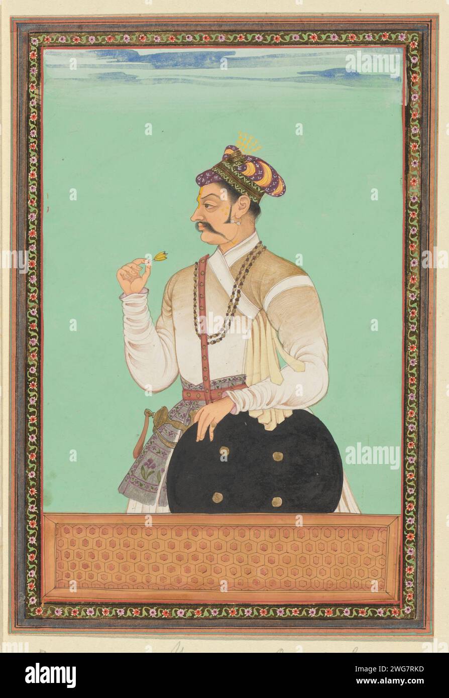 Portrait of Raja Karan, who has been Aurangzeb's sights, c. 1686 drawing. Indian miniature Raja Karan is depicted up to his hips, used to the left, in his right hand a flower, his left hand rests on a shield. Page 16 in the `Witsen-Album ', with 49 Indian miniatures of princes. Above the portrait a piece of paper with the name in Persian. Under the portrait a piece of paper with the name in the Portuguese. Golkonda paper. deck paint. gold leaf. gouache (paint) brush ruler, sovereign. historical person (...) - historical person (...) portrayed alone Stock Photo